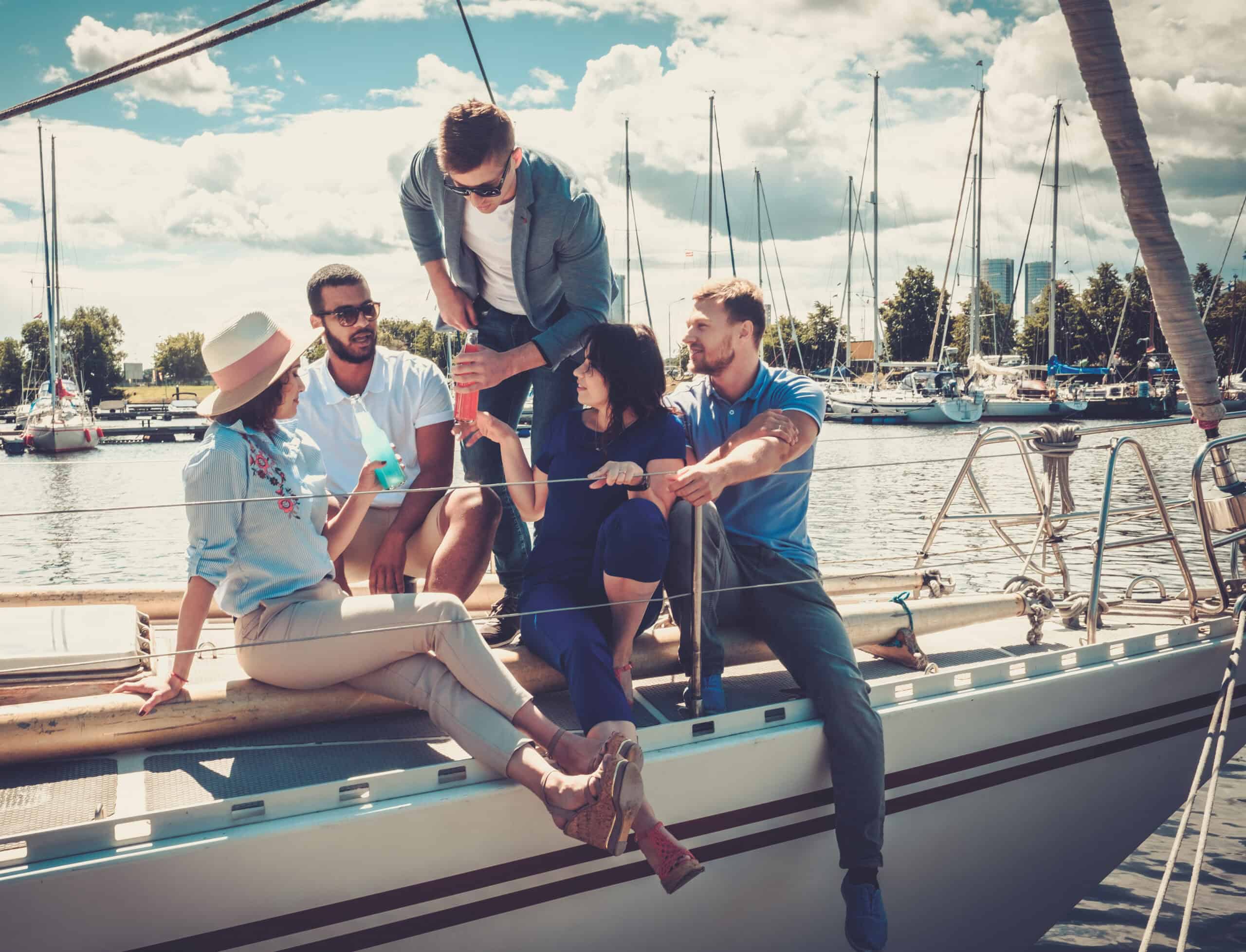 happy friends resting on a yacht 2024 10 18 07 30 16 utc scaled